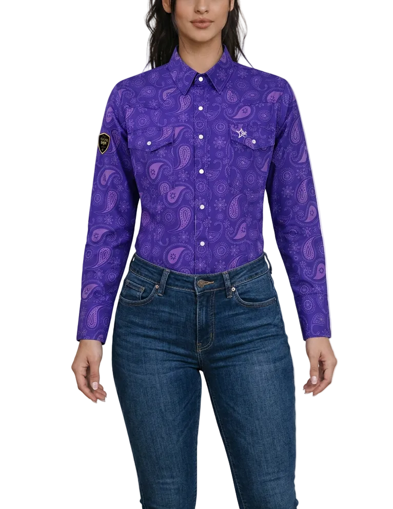 A woman wearing a purple long-sleeve FR button-up shirt with a paisley pattern and blue jeans, shown from the nose down against a plain white background.